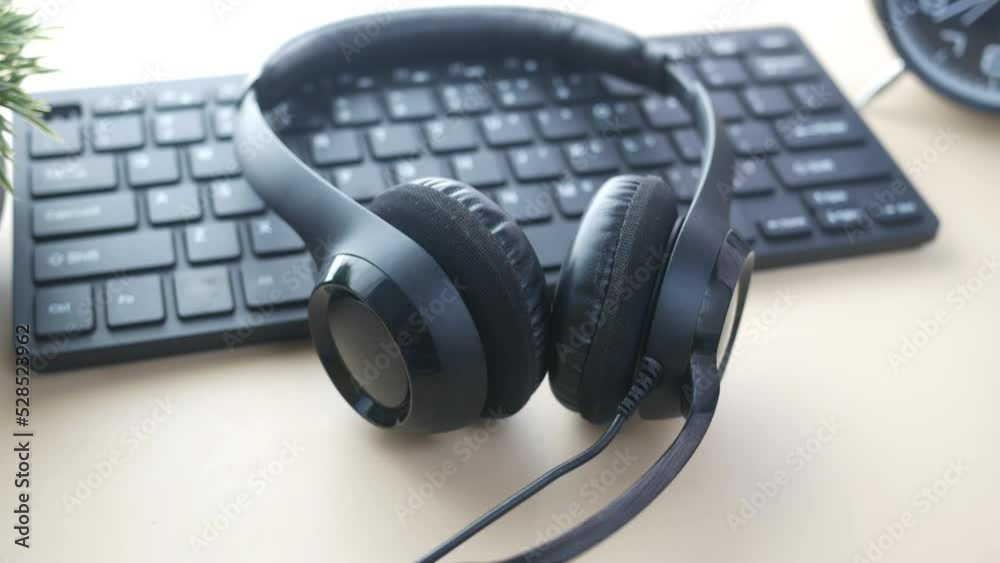 call center headphone on laptop on table , call center headphone on laptop on table ,