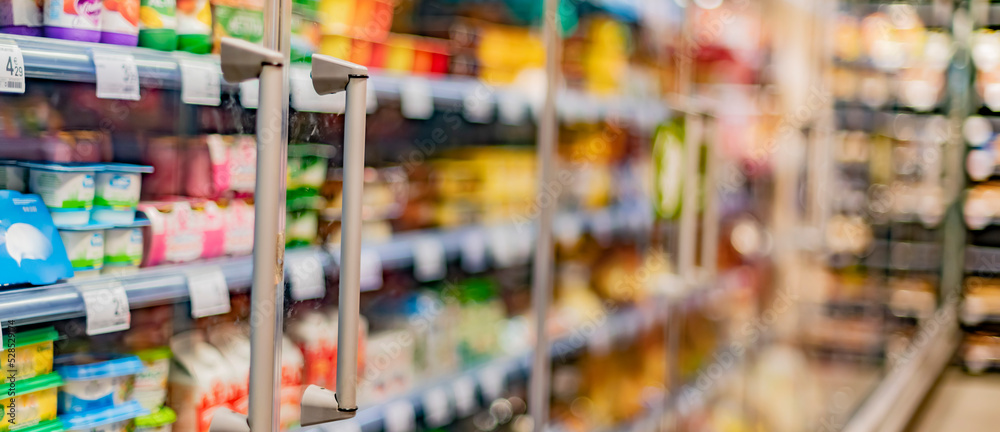 Food products displayed in a commercial refrigerator