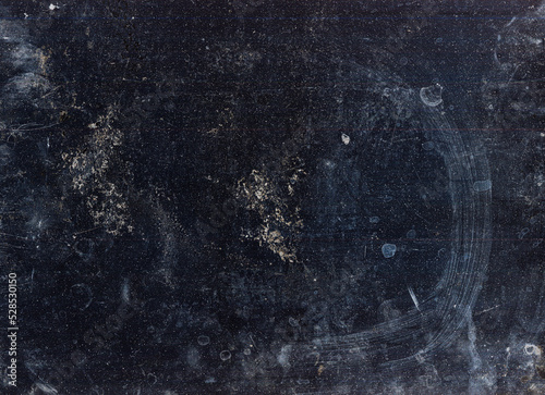 Old worn overlay. Dust scratches texture. Used surface. Blue beige dirt grain stains noise on distressed uneven dark abstract illustration background.