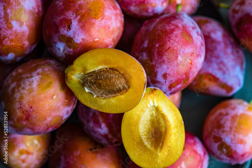 Heap of fresh plums photo