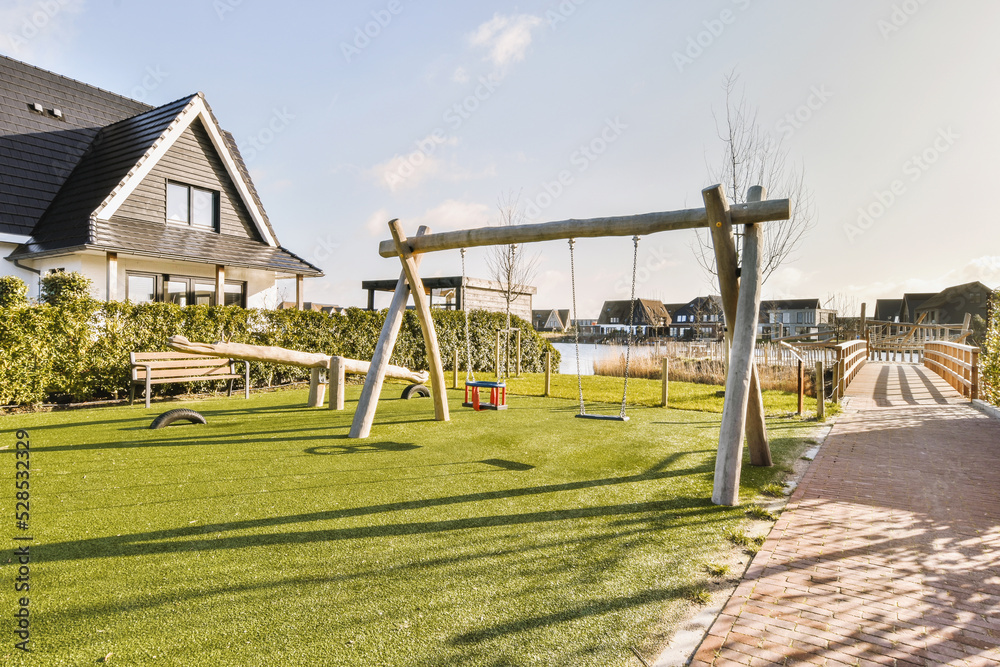 Equipped playground in city residential district in daytime Equipped playground in city residential district in daytime