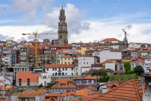 Skyline of the city of Porto seen from the tower of the cathedral. With a blue sky full of white clouds. © Montse