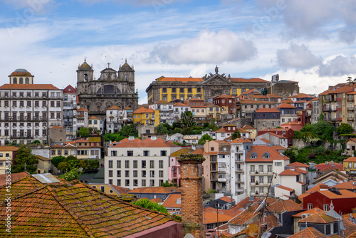 Skyline of the city of Porto seen from the tower of the cathedral. With a blue sky full of white clouds.