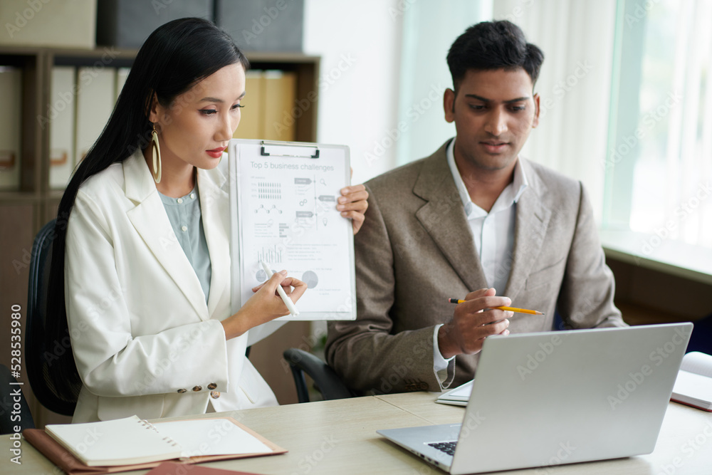 Businesswoman Showing Chart at online Meeting Businesswoman Showing Chart at online Meeting