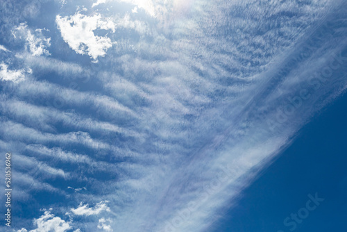 Cirrus and Stratus clouds in dramatic blue sky over Cape Town