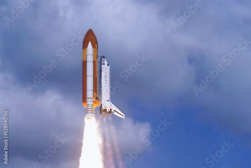 Fototapeta Naklejka Na Ścianę i Meble -  Launch of a space shuttle into space. Elements of this image furnished by NASA