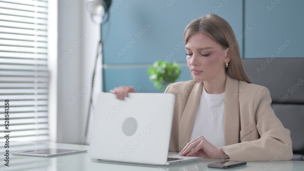 Businesswoman Closing Laptop Standing Up, Going Away Businesswoman Closing Laptop Standing Up, Going Away