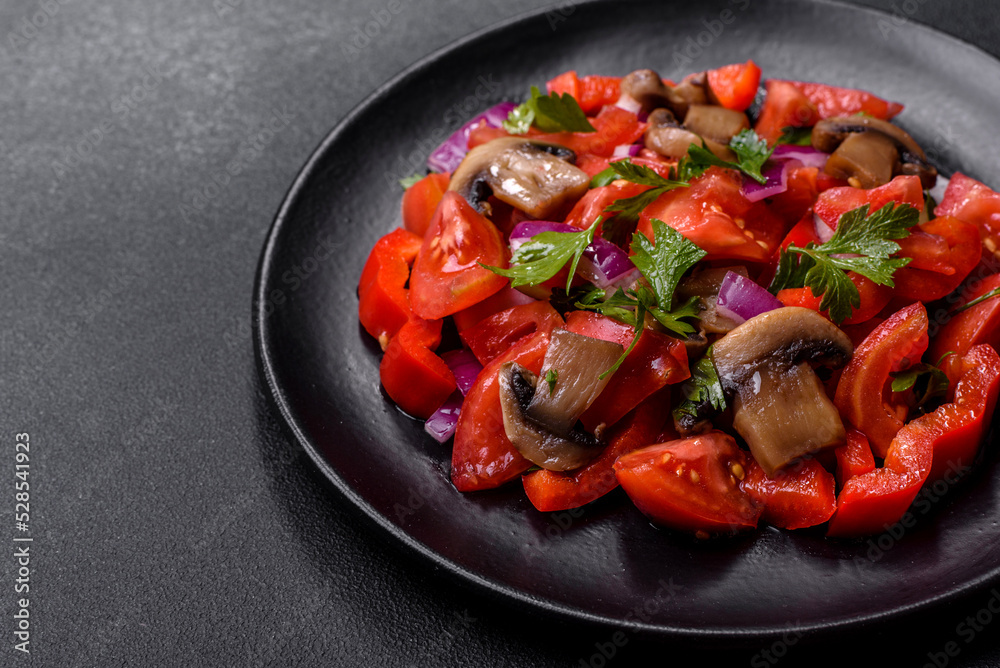 A salad of baked mushrooms, tomatoes, onions, parsley, spices and herbs