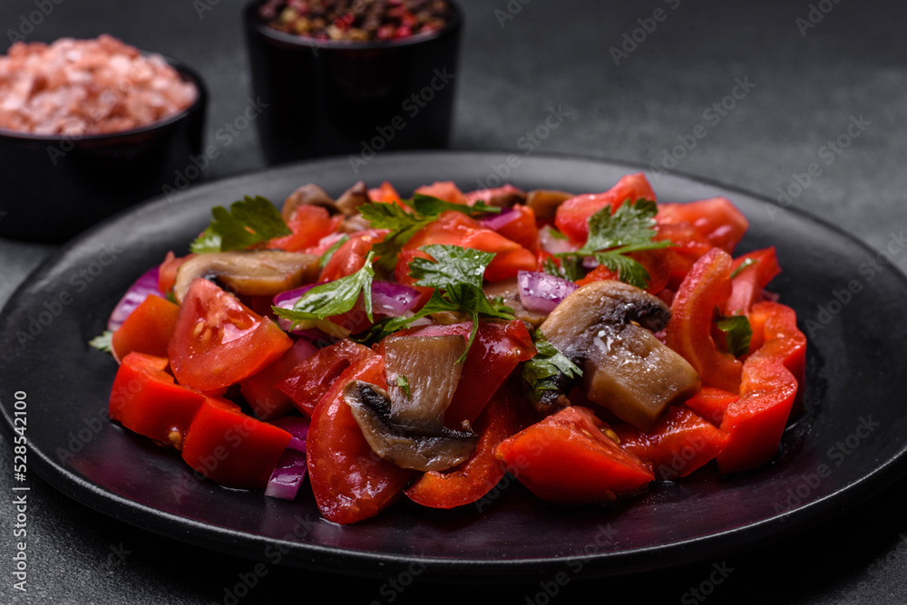 A salad of baked mushrooms, tomatoes, onions, parsley, spices and herbs A salad of baked mushrooms, tomatoes, onions, parsley, spices and herbs