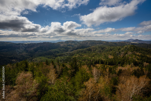 Great view to the amazing and deep forests on the northern Bohemia. Such a nice and calm place with cool hike. © Tadeas