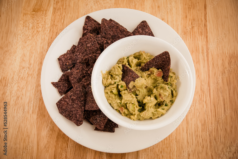 Guacamole with chips - mexican food Guacamole with chips - mexican food