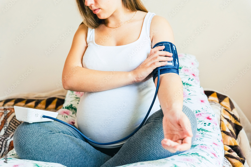 Pressure test pregnancy woman check. Pregnant mother with blood test