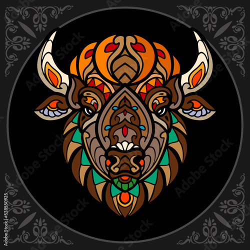 Colorful bison zentangle arts isolated on black background