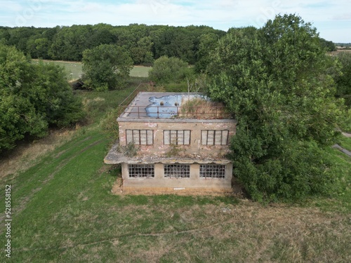 
Aerial view of World war two military airfield control tower at Forma RAF Woolfox Lodge Aerodrome. Rutland, England. Royal Air Force Woolfox Lodge or more simply RAF Woolfox Lodge  photo