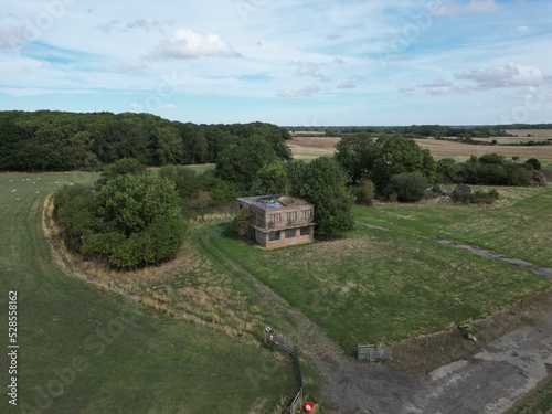 Slika na platnu Aerial view of World war two military airfield control tower at Forma RAF Woolfox Lodge Aerodrome