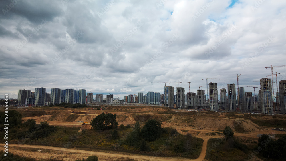 Construction site of a new city block. Construction of multi-storey buildings. Aerial photography. Construction site of a new city block. Construction of multi-storey buildings. Aerial photography.