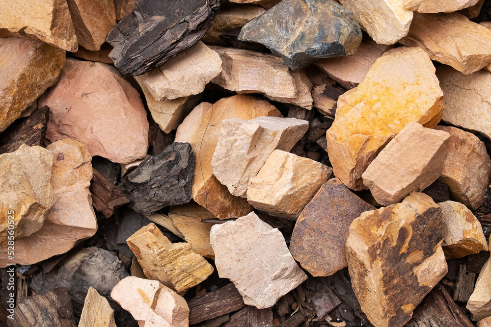 A bunch of different stones, background or texture A bunch of different stones, background or texture