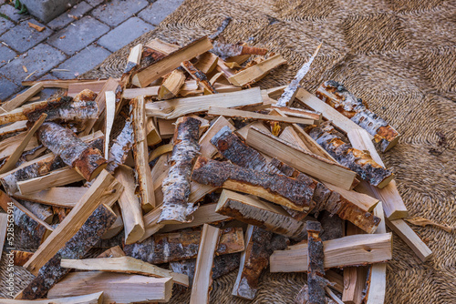 Bilde på lerret Close up view of birch firewood of different sizes for kindling fireplace