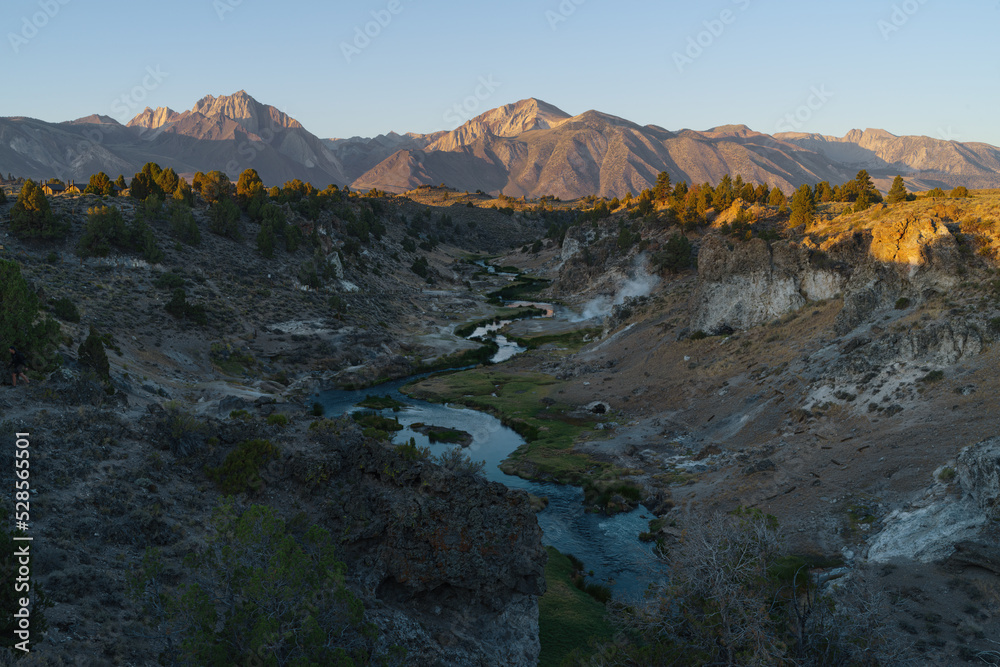 Hot Creek near Mammoth Lakes in California shown against the Sierra Nevada range. Note the steam emanating from hot springs.