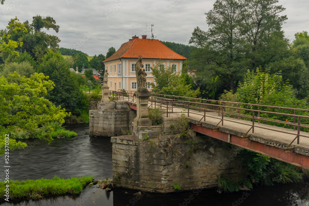Fototapeta premium Vyssi Brod town with monastery in summer cloudy day