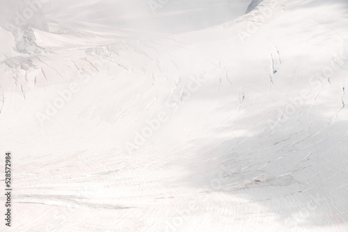 Detail of alpine glaciers with brittle snow and ice.