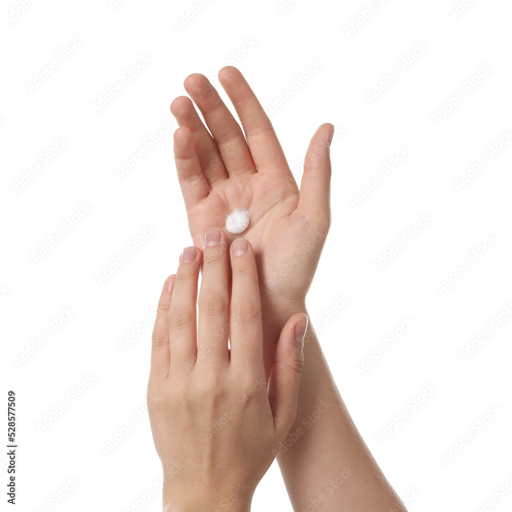 Woman applying cream on hand against white background, closeup Woman applying cream on hand against white background, closeup