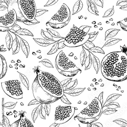 Seamless pattern with pomegranate fruits, seeds and branches. Black and white hand drawn vector illustration.