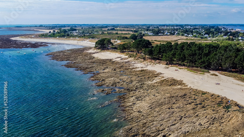 Aerial view of the Pointe de Kerpenhir at the entrance of the Gulf of Morbihan in Brittany  France - Rocky peninsula at low tide in the Atlantic Ocean