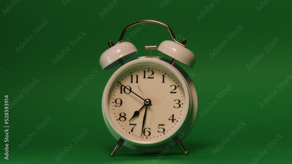 analog clock goes on a green screen, timelapse, fast passage of time. analog clock goes on a green screen, timelapse, fast passage of time.