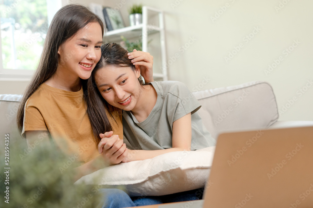 LGBT group. Good looking lesbian couples smiling and happily at home, cuddling, warm hugs, teenager's first love, married couple, warm family, lover in love LGBT group. Good looking lesbian couples smiling and happily at home, cuddling, warm hugs, teenager's first love, married couple, warm family, lover in love