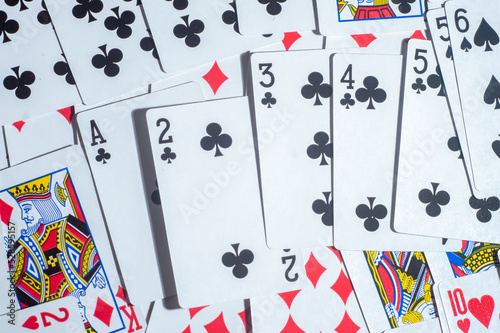 Casino cards poker blackjack,hand holding poker chips with copy space and deck card background