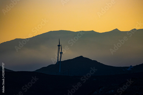 wind turbines on the hill at dawn