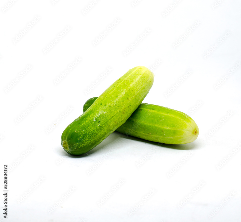 Fresh cucumber on the white background