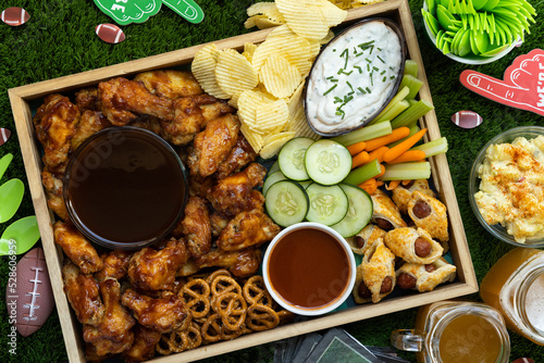 Canvas Print Close up of healthy Football game day tail gate party tray filled with snacks and finger foods for friends and family fun