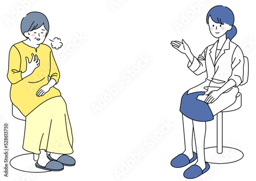 医師の説明に安心するシニア女性
