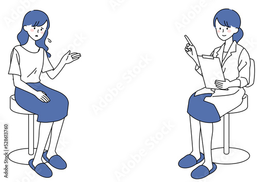 医師に不安を訴える女性患者