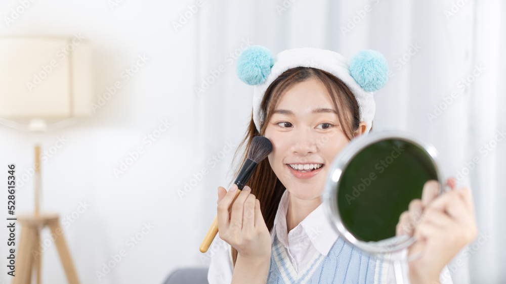 Beautiful women with social media influences are teaching makeup and use cosmetics, In front of the camera to recording vlog video live streaming, Online business on concept of beauty bloggers. Beautiful women with social media influences are teaching makeup and use cosmetics, In front of the camera to recording vlog video live streaming, Online business on concept of beauty bloggers.