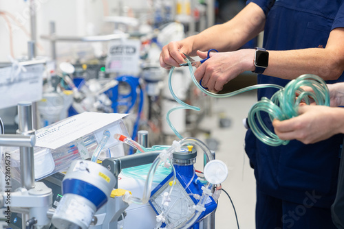 Nurses hands preparing equipment