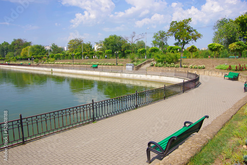 Wallpaper Mural Moldova. Kishinev. 08.29.2022. Embankment of the lake in the walking area and alleys. Torontodigital.ca
