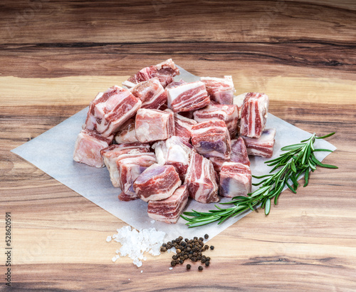 Beef Short ribs with rosemary, peppercorns and rock salt on wax paper