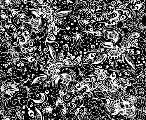 Beautiful abstract vector seamless pattern with hand drawn ornament, monochrome engraving style