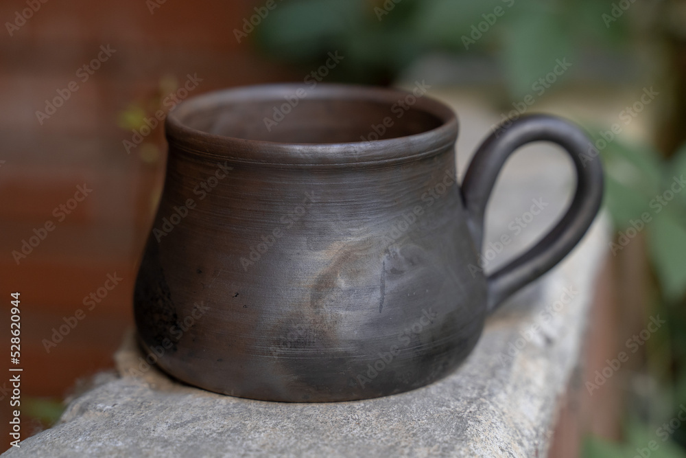       Ceramics, a ceramic product made with your own hands, made on a potter's wheel, a jug, a mug, clay. 