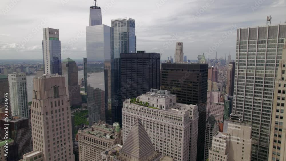 Aerial view of Manhattan in sunset rime. Skyscrapers in New York. Wall street of down town NYC. Aerial view of Manhattan in sunset rime. Skyscrapers in New York. Wall street of down town NYC.