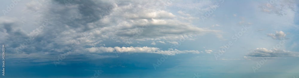 Fantastic clouds against blue sky, panorama Fantastic clouds against blue sky, panorama