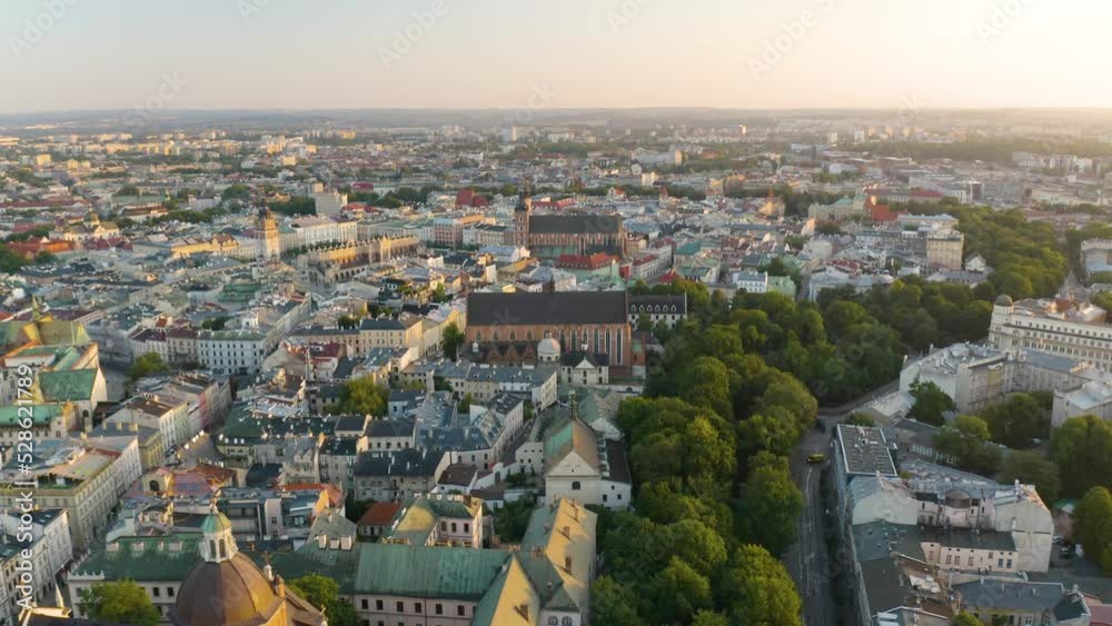 Drone Flies Over Krakow, Poland at Sunrise in Summer Drone Flies Over Krakow, Poland at Sunrise in Summer