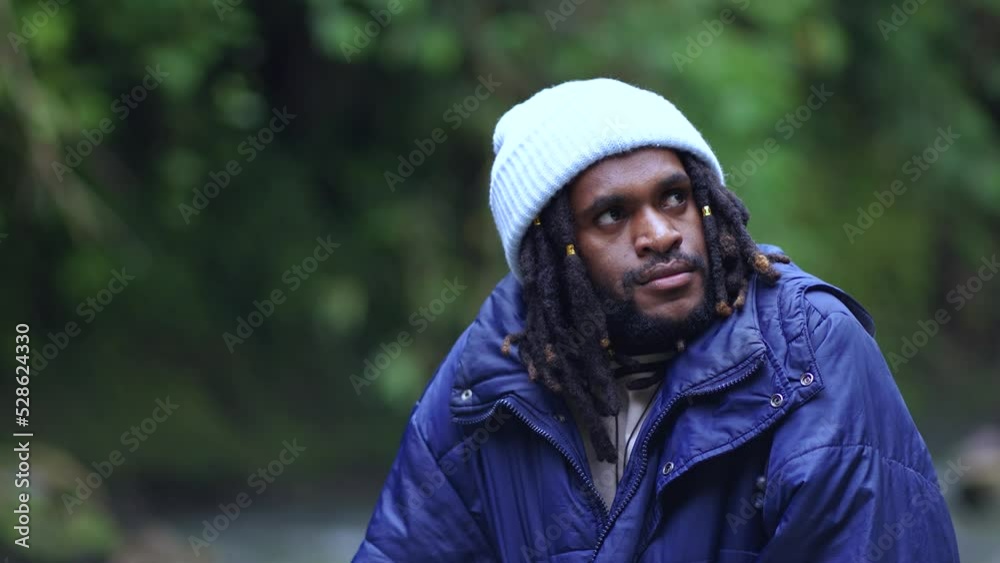 A Man With Dreadlocks Suffering From Coldness A Man With Dreadlocks Suffering From Coldness