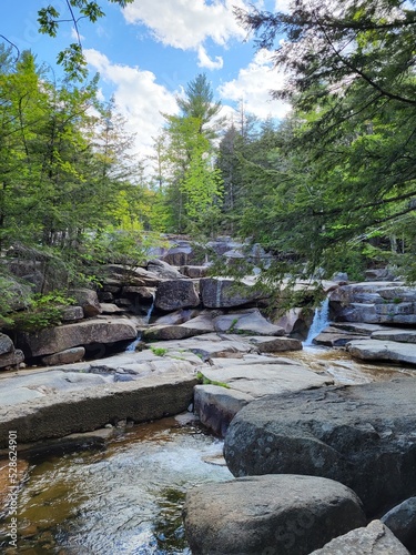 Diana's Baths waterfall on rocks with trees in New Hampshire