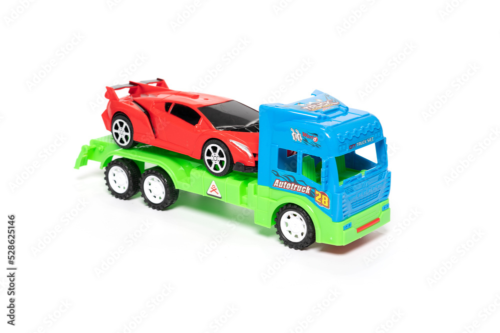 Car transporter truck toy isolated on white background Car transporter truck toy isolated on white background