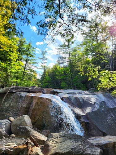 Diana's Baths waterfall on rocks with trees in New Hampshire