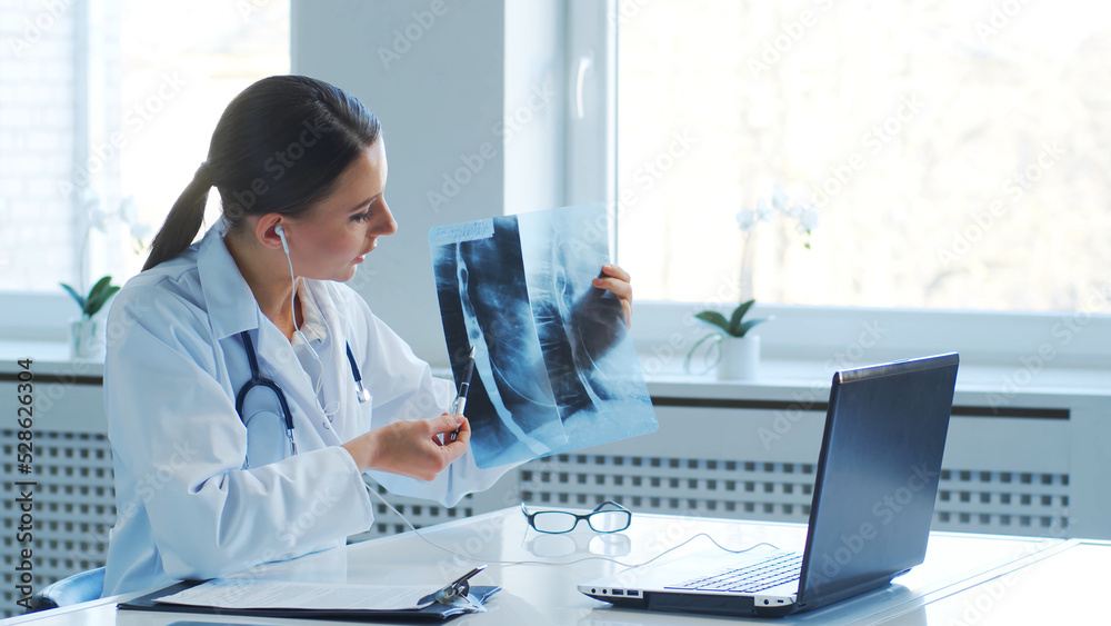 Professional medical doctors working in hospital office making conference call. Medicine, healthcare and online consultation.